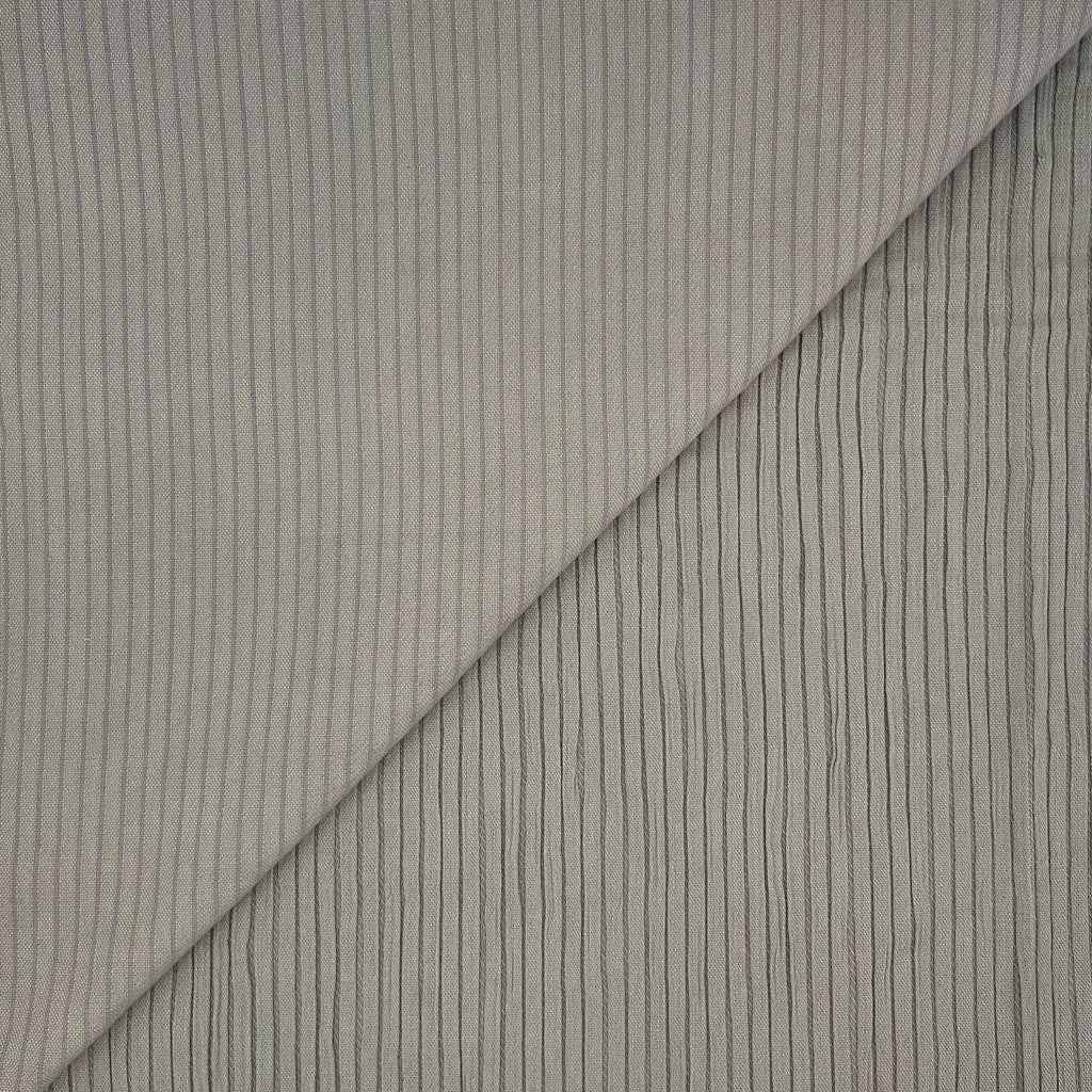 Tessuto arredo plissettato tinto in filo